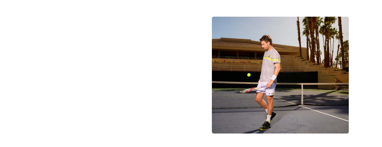 Image of a tennis player with a racket and tennis ball on a court