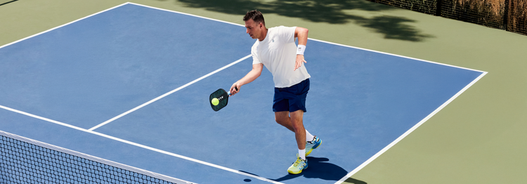 Matt Manasse playing pickleball on a court